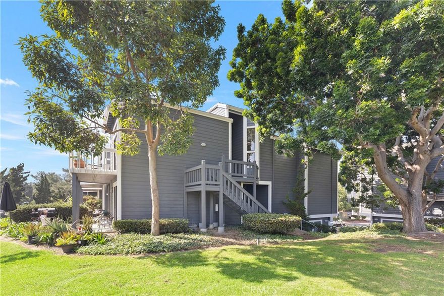 Welcome to your Beach Penthouse! Located in the highly coveted Seabridge Village Community, nestled on a quiet street and steps from the clubhouse and pool. This corner unit offers two bedrooms, two bathrooms, plus A LOFT. Upon entering you are greeted with cathedral ceilings and windows throughout providing natural light. Sip your coffee, or take in the sun on the large wrap around balcony that overlooks lush landscaping including a green belt, calming lake with waterfall, and wildlife. The open floor plan is light and bright with blue skies, and green trees peeking through the large windows. The slate fireplace is perfect to cozy up at night, and there is enough space for friends and family to gather. The Master bedroom and bath boast of your own spa-like oasis offering a large shower tub and sauna. The sky light in the secondary bathroom provides a touch of the outdoors and offers a floor to ceiling slate shower. Cast Iron cascades down the spiral staircase that leads to an extra-large loft. This area awaits your personal touch. An office, gym, or even space enough for an additional bedroom. True resort-style living with amenities for use year-round including two pools, two spas, four well-maintained tennis courts, racquetball court, Clubhouse and much more.  Explore the outdoors along sidewalks surrounded by tranquil waterfalls, stone streams, lakes, mature trees, and wild life. Seabridge Community is gated with 24-hour security, and is biking distance to the famous Huntington Beach Pier, Pacific City, Sandy Beaches, Shopping, Dining and all that OC has to offer. This is a must see!