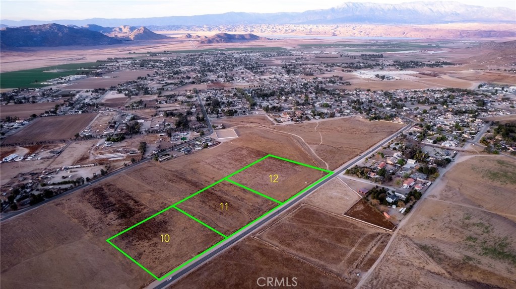 Welcome to Your Dream Home Land! Located at 0 Montgomery Ave, Lot SVOL 12, this 4.67-acre parcel sits on a paved road in the heart of Nuevo, with potential for a lot split (subject to county approval). The property is mostly flat with some gentle slope, providing excellent opportunities for residential development. Enjoy stunning mountain views and plenty of space to build your custom home or place a manufactured home (permitted). It’s also ideal for horse property.The seller completed percolation tests years ago for much of the subdivision. The property will require a septic system and well. The lot has not been surveyed, and the images provided give an approximate location. Additional adjacent parcels are available for sale, each sold separately. CALL TODAY-MUST SEE!*Seller financing available with a 35% down payment, an 8% interest rate, and a 2-year term.