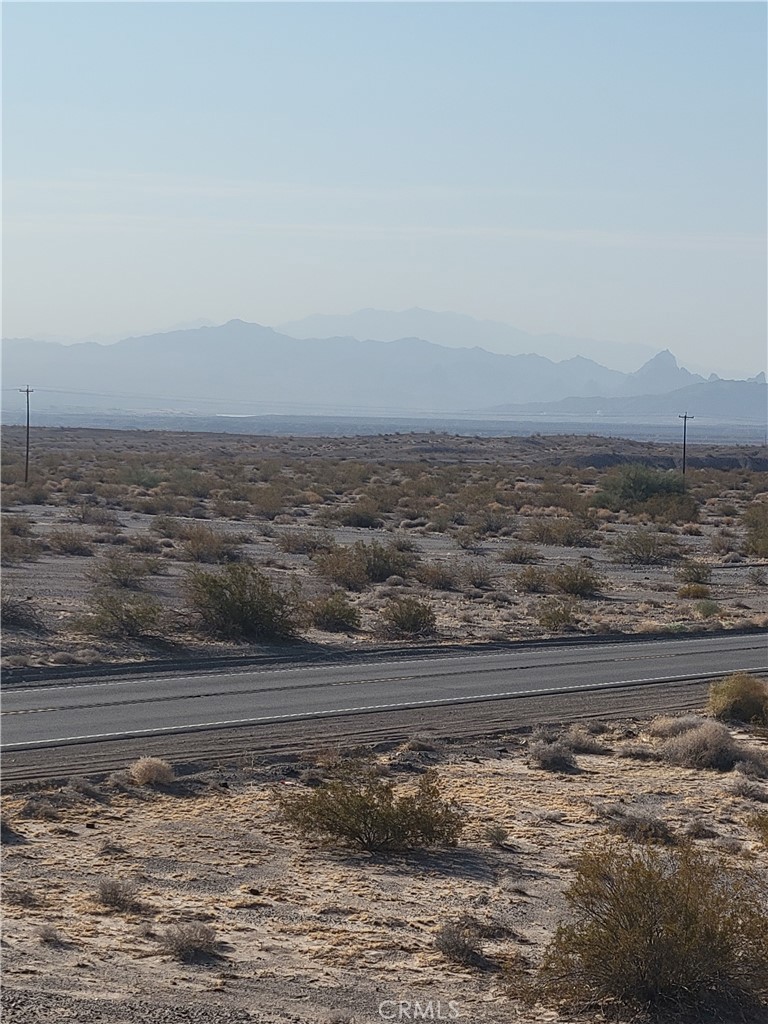 This parcel, made up of undisturbed desert land can be purchased all or in part. It shares a western border with parcel 0650 242 01 which consists of 146.6 acres. The highway divides the two parcels, creating an enormous length of highway frontage. The parcel is located within the Needles, CA city limits and is about 2.5 miles south of I-40 on Highway 95 south.