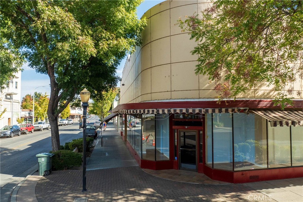 This space offers fantastic opportunity for commercial retail, clothing, grocery store or office space with high traffic and visibility. There is a prep kitchen area with 3 compartment sink installed. Stunning windows for showcasing inventory and ample wall space for merchandise. The Historic Downtown Oroville District is revitized with developers restoring downtown buildings. Located on the block of the recently renovated State Theatre, City of Paris building, and located near anchor jewelry stores, salons, and shopping boutiques. The State Theatre brings thousands of attendees to town each year for the stunning music, shows and entertainment. This space is also located near a high traffic, local 24 hour gym that brings in thousands to downtown, generating high visibility and exposure to this space. 2005 Bird Street is located near ample fee public parking, and is ready for your business to locate here! The property is very well maintained with high standards by the property owner. Corner retail space, with new roof; central heating and air and updated electrical. Call today for your private tour. Note, this space is also listed as an large space up to 12,800 available square feet, as the space is partitioned. The lease price includes CAM for the shared ADA restrooms and hallway.