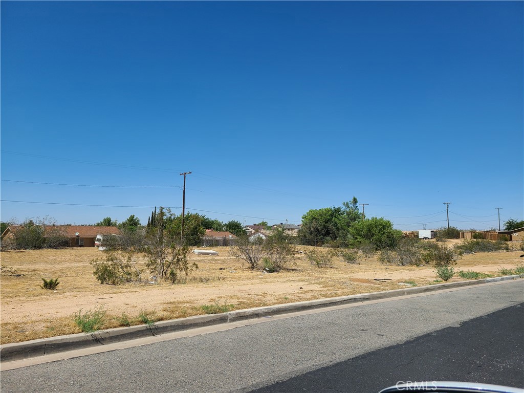 One of three adjacent 9,375 sf lots for sale in Victorville. Can be purchased separate or all together. This listing is for Tract No 7636, Green Tree North No 1 Lot 10. MDR zone (mixed density residential) with highest and best use for Duplex's. The area is bounded by Puesta del Sol Drive to the north, Tawney Ridge Lane to the east and south, and Green Hill Drive to the west. The neighborhood consists mostly of single family dwellings and is within proximity to the 15 Freeway, Horseshoe Lake, Spring Valley Lake, a Golf Course, entertainment, shopping, parks, schools, restaurants, etc. Dimensions: 75X125