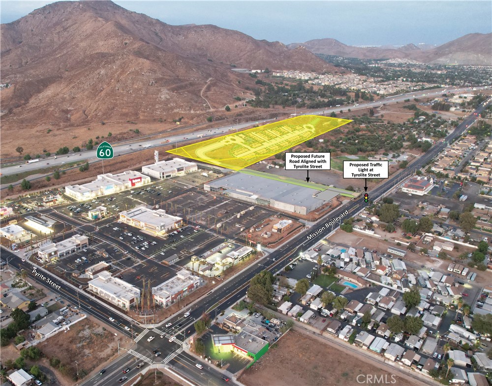 The CBC Land Team is pleased to present the offering of 9.94 gross acres of land adjacent to the new “Shops at Jurupa Valley” regional center off the 60 Highway and Pyrite Street. The site is zoned for high density residential development with a density range of 20-25 DU/AC. We have provided a conceptual site plan calling for 79 attached townhomes on a 4-acre net pad in addition to a cost to complete analysis based on that site plan. This plan is purely conceptual and can be redesigned to fit your preferred pad size, density, and product type. Please refer to our Offering Memorandum for more information. The purchase price has been significanlty reduced to $1.5M as owneship is targeting a quick-close sale.
