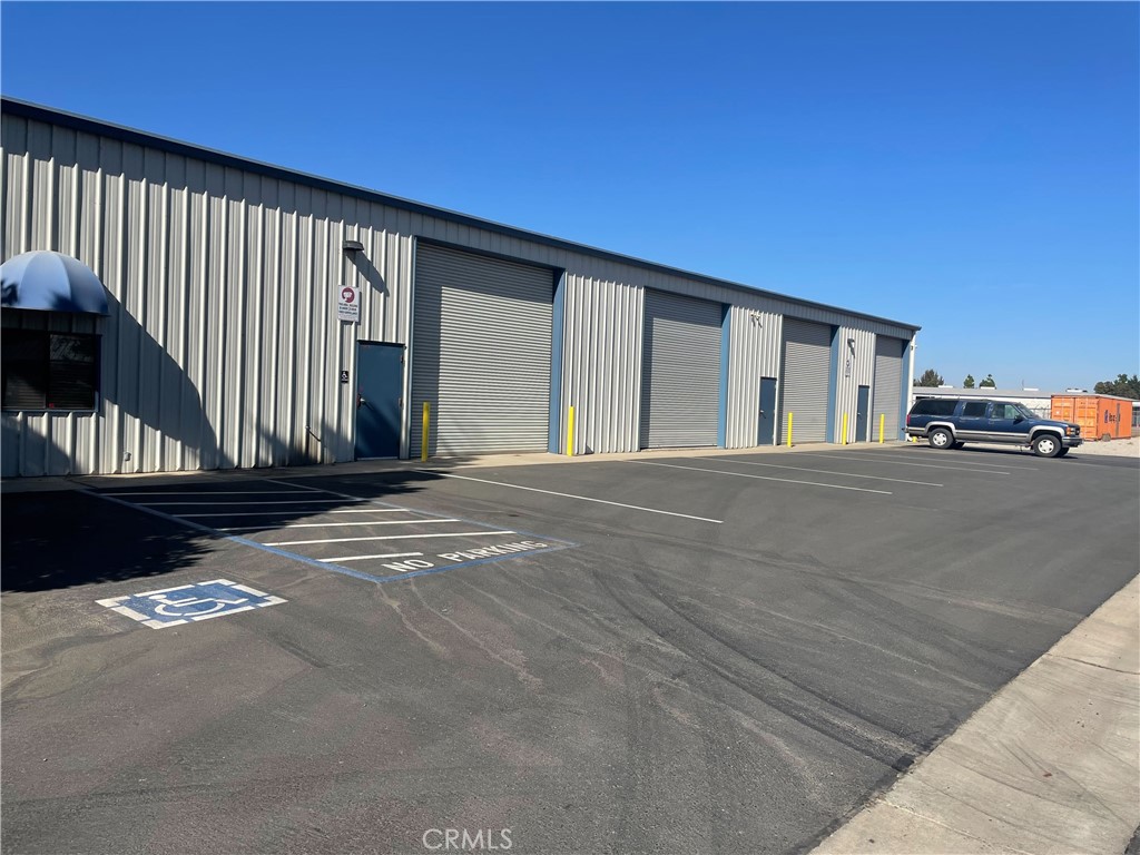 Perfect shop and office in one! Zoned as light industrial this turnkey shop is ideal for a contractor or service vendor operation. This 2006 steel frame build comes with, three reserved parking spaces, two bathrooms, two high clearance roll up bays, two stand alone wash basins, ample lighting and parking. Property Lease is currently offered as a Modified Gross at $3,000.00 a month.