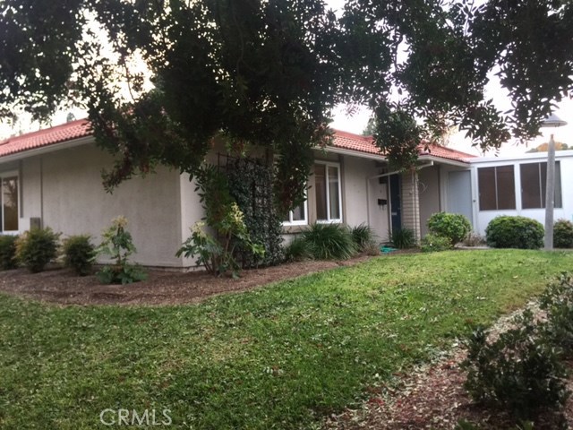 Beautiful single-level home with 3 bedroom and 2 baths in this senior community. Open floor plan with bright living area, dining and kitchen are sun drenched by three skylights. both guest and master baths are flooded in natural light from custom skylights. Throughout the entire house, you will find custom crown molding, stunning tiles, new wood laminate flooring and dual panel windows...conveniently located near great shopping and dining venues..