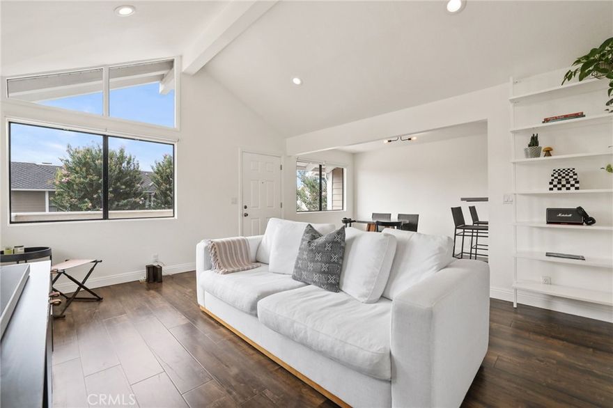 Welcome to Walnut Village, a picturesque, tree-lined community in the heart of Old Town Orange. Just a 5-minute walk from Chapman University and the historic shopping center, enjoy easy access to charming shops and unique dining experiences. This turn-key 2-bedroom condo offers 924 sqft of open living space, featuring vaulted ceilings and an abundance of windows that fill the home with natural light. The oversized primary bedroom and spacious secondary bedroom offer plenty of comfort. The updated kitchen is a chef’s dream, with sleek stainless-steel appliances and elegant quartz countertops. The beautifully remodeled bathroom boasts custom tile work, and the indoor laundry makes life convenient. Parking is effortless with an oversized 1-car garage that includes additional storage, along with a reserved parking space located directly in front of the home and there are several additional unassigned parking spaces located throughout the community.  Walnut Village offers fabulous amenities, including a swimming pool, jacuzzi, sports court, and expansive grassy areas perfect for enjoying time with friends and family.