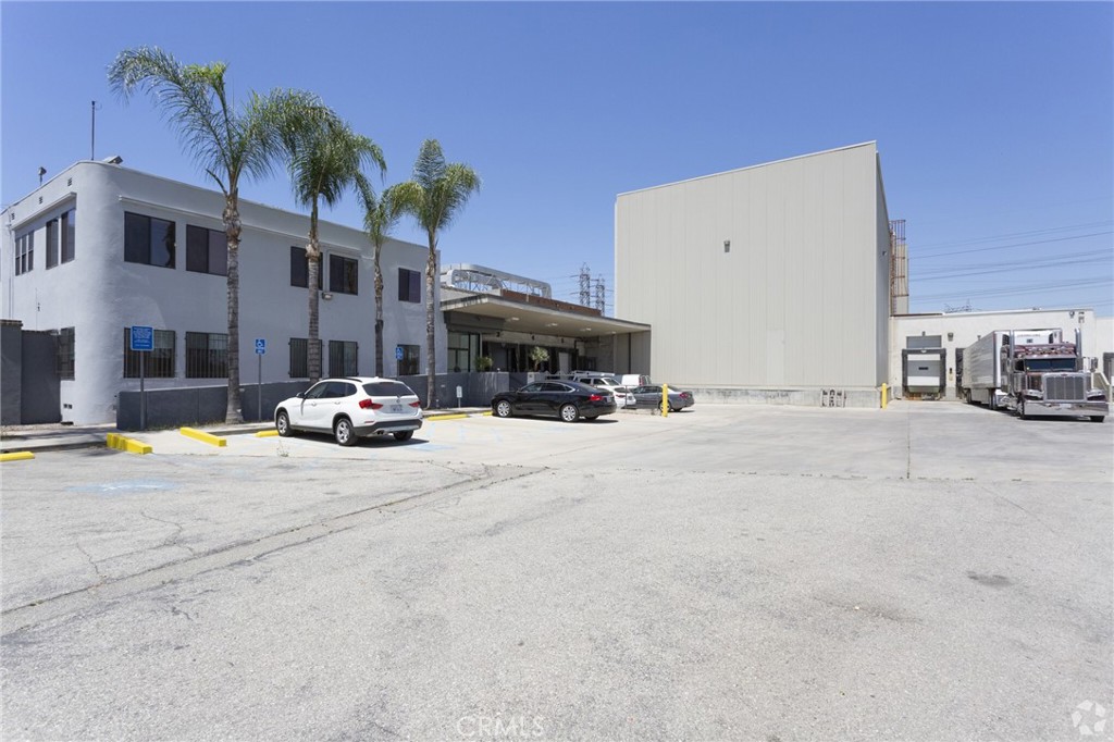 Don't Miss Out On This Great Investment Opportunity!!!
Food Processing & Cold Storage warehouse Facility
| 44,500 SF | additional 700 sqft was added | lot size is 116,740 sqft = about 2.5 acres | 3000 SF of Offices | Ample Parking | 13 Dock High Doors | 2,000 Amps...
The property offers stable cash flow with fixed annual 3% rent increases over the lease term. The lease is backed by BPCP SALSA HOLDINGS LLC, part of Blue Point Capital Partners and its Blue Point III portfolio company, Italian Rose Gourmet Products, announced the acquisition of La Mexicana Food Products, a fresh, refrigerated salsa manufacturer based in Los Angeles, California. This transaction represents the first add-on acquisition for Italian Rose since Blue Point acquired the platform investment in November of 2017. Italian Rose, headquartered in West Palm Beach, Florida, is a leading manufacturer and distributor of premium salsas, dips, sauces and spreads to major retail and foodservice channels. The addition of La Mexicana’s West Coast operations to Italian Rose’s East Coast presence will put the combined Company in a select universe of truly national salsa producers, as well as provide increased scale, production diversity and product breadth to both companies’ customers.