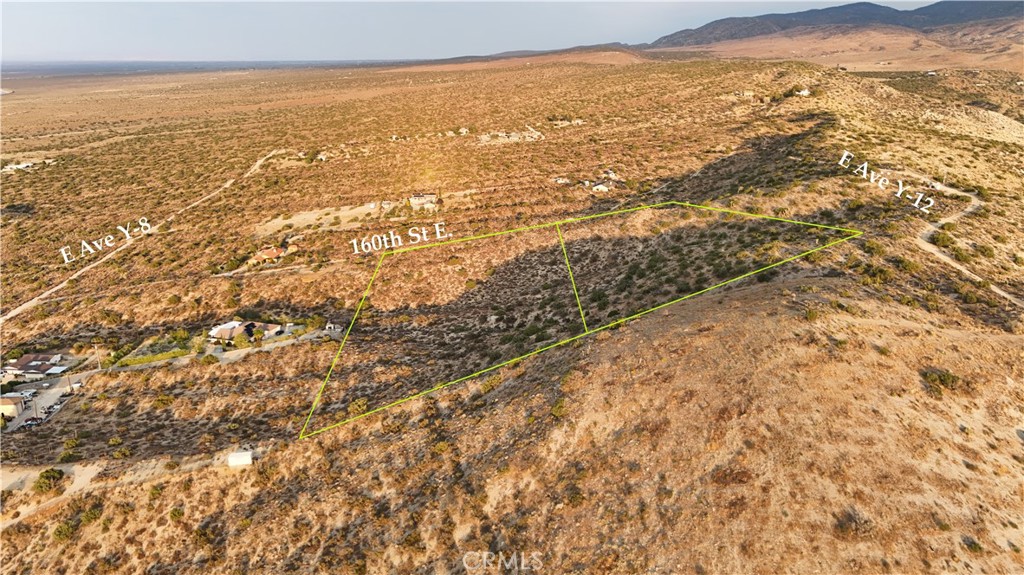 APN# 3061-021-083 4.09 ACRES APN# 3061-021-085 1.42 ACRES Two parcels Overlooking Crystalaire Country Club and overlooking the Valley great Views.