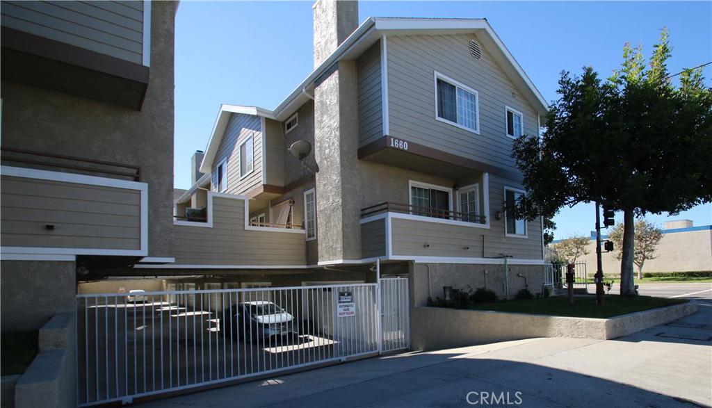 This townhome end unit is located in a small gated community. It features 3 bedrooms 2 1/2 bathrooms in beautiful city of Torrance. The gorgeous kitchen is charming with dark wood cabinetry, and stainless steel stove and attractive stove vent. The granite counter tops have decorated tile back splash. The newer laminate flooring, vaulted ceilings throughout adds warmth in the living room and the dining room. Newer paint interior with recessed lighting in kitchen and living room. In the garage for your convenience there are laundry room hookups. The home is well maintained and cherished by the current owner and ready for the new homeowner to move in.