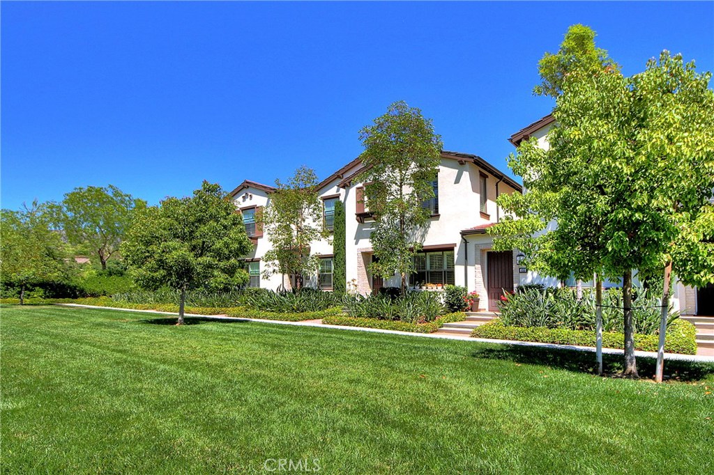 Located in the highly desirable Orchard Hills Community of Irvine. The model perfect home is in the neighborhood of Entrara plan 3, One of the Best locations you will ever find. The home is super bright & airy with an open floor plan. A beautiful green area is right in front of the entrance, you will have more than ever privacy living in the community. Spacious living with tile flooring, window shutters, recessed lights, crown molding throughout downstairs, open floor concept with beautiful Center Island in the gourmet kitchen with plenty of white cabinetry, stainless appliances. Upstairs to the 2nd floor, you will find a computer tech area, laundry closet with stackable washer & dryer, Master suite with upscale vanity areas, shower still, tub, walk-in closets. Hall bath shares two other secondary bedrooms. Direct Access 2 car Garage. Award winning Canyon View Elementary Schools, just steps from Orchard Terrace Park which include Pool, Spa plus a Huge Kids Playground, shade structures, barbecues and picnic tables. Walking distance to Orchard Hills Village shopping Center and dining, and numerous parks& sport courts/fields. Refrigerator, Washer and Dryer are included! Best Place To LIVE.