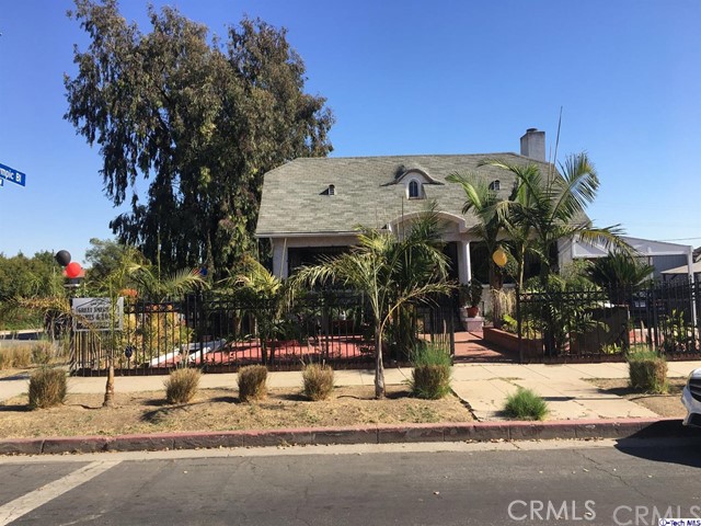 A cozy and well maintained property that offers a lot of add-ons, a total of 4 bedrooms and 2 1/2 baths (Buyers please check permit). A formal living room with hardwood flooring, gas fireplace, 2 attractive chandeliers, formal dining room and a kitchen with granite counter tops. Master suite with A/C window unit and wall furnace for the 2 bedrooms. Yard easy to maintain. Basement is used for laundry and storage. Garage converted into living room for recreation with half bath and storage that can be used as a unit. Located near Mid-Wilshire adjacent to K-Town and Hancock Park.