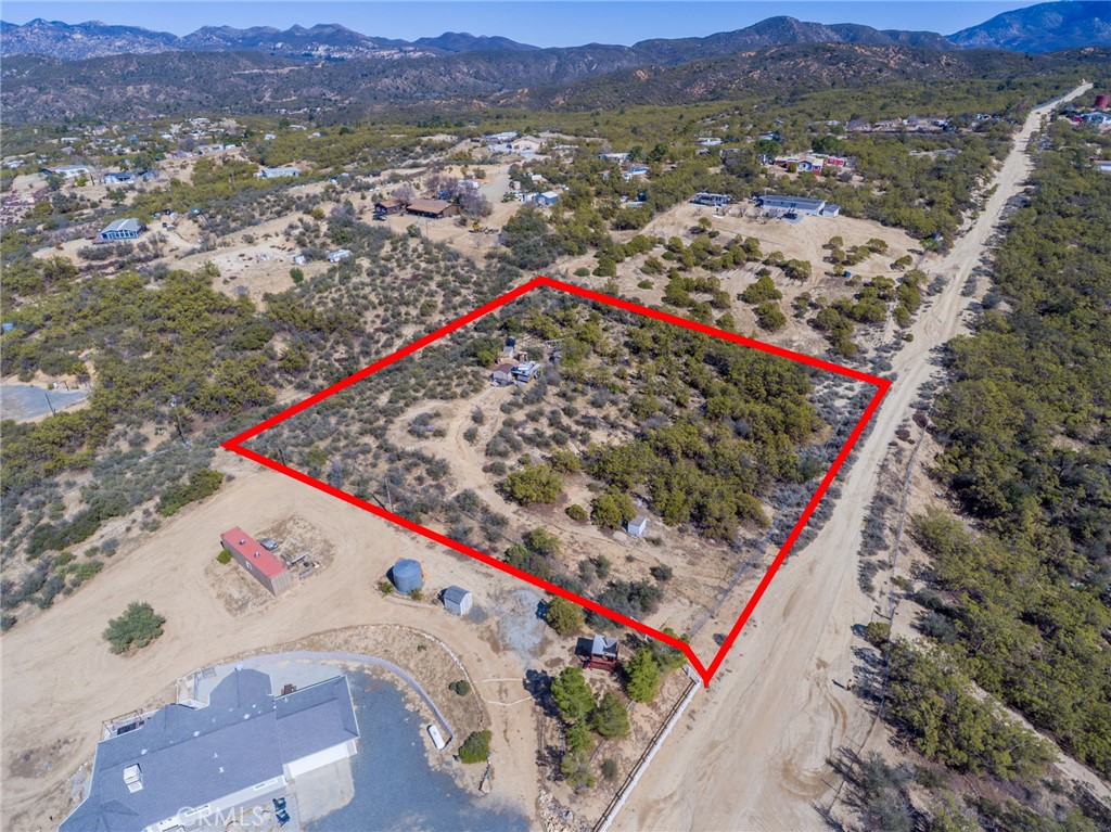 Enjoy the sounds of nature from your doorstep, and let the stress of the day melt away. Whether you're looking for a weekend getaway with the family or a year round sanctuary, this beautiful property is ready
This 2.3 acre lot, located in Anza, is zoned R-T and allows for Mobile home subdivisions with minimum lot size of 7,200 sqft. Potential of 13 lots or up to 27 lots with an included recreation area within the subdivision.
Build your dream home, mobile home subdivision or simply place a tiny home for the weekends.
There are 2 sheds on the property, a well and 2,500 gallon tank on the property included with the sale.
to welcome you.So many options in our area for animals, plant life, fruit trees. Located close enough to Temecula, Idylwilld, Hemet, Palm Desert, Palm Springs..Come and breathe the fresh air. Selling as vacant land.