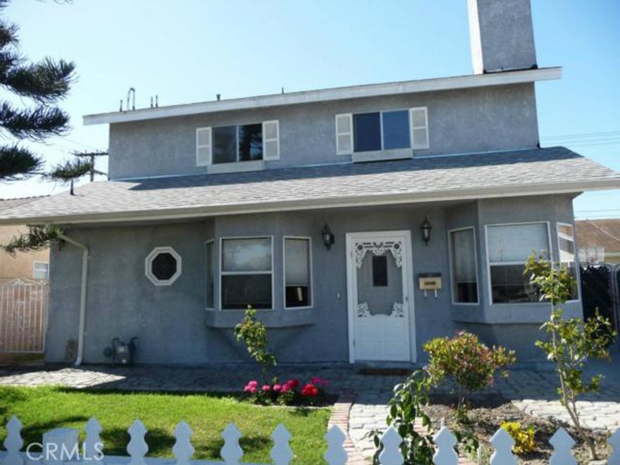 2 stories, remodeled beautiful house, 4 bedrooms plus large bonus room could be used as bedroom, home heather, big balcony on second floor,  2 bedrooms downstairs, 2 fireplaces, newer stove, ABC school district, Cerritos high school, nice and quiet area of city of Artesia, garage used as bedroom, lots of amenties, rent low near $1.20 per sqft. trash fee included in the rental. won't last!