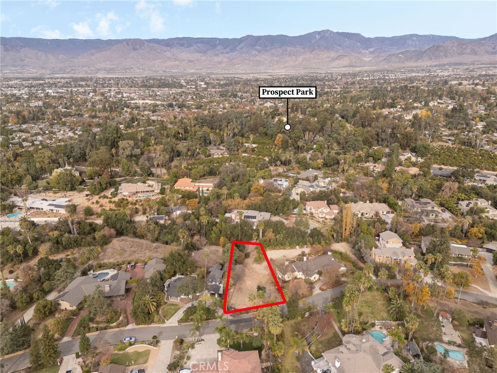 LOCATION LOCATION. Prime South Redlands half acre lot near Prospect Park and Kimberly Crest. Central to Redlands Country Club and Downtown Redlands. Excellent schools. Once in a lifetime opportunity to build your dream home on your dream street! ALL utilities are available in this established neighborhood. Sewer is in area, not connected. Buyer to complete due diligence on connecting to utilities and best land use.