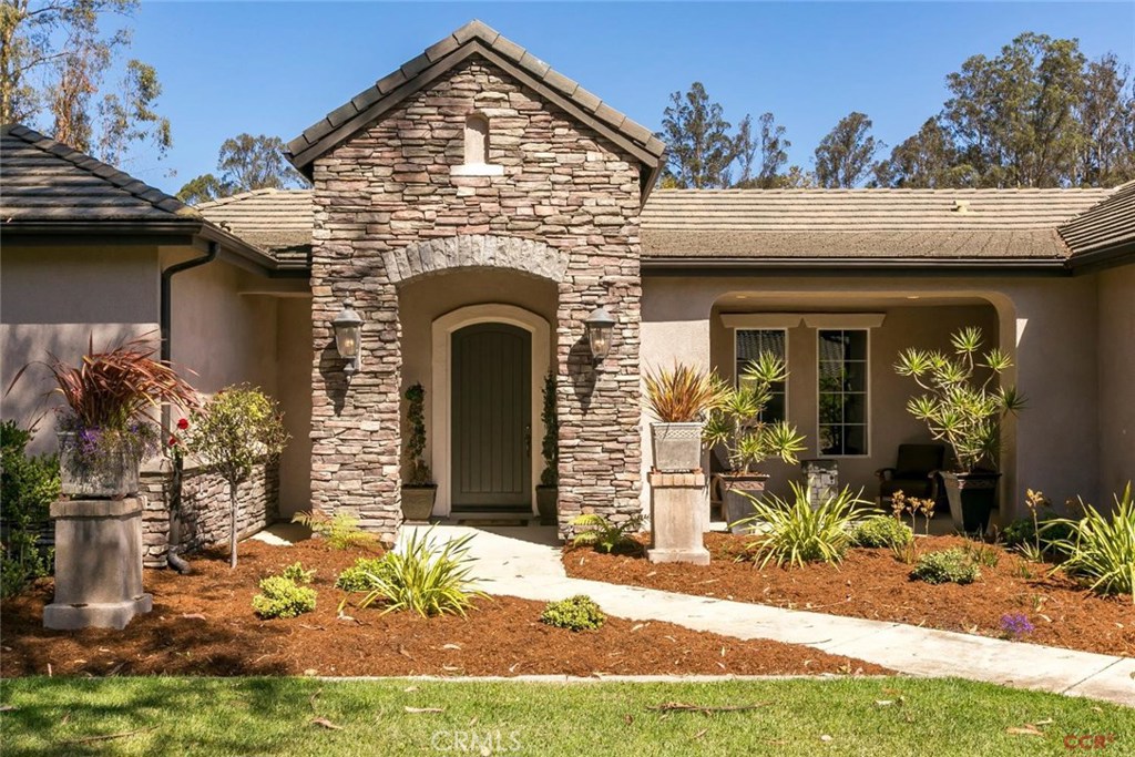 Come enjoy luxury living on California's Central Coast at Knollwood Estates. This breathtaking estate boast the largest square footage and largest lot of any home in knollwood, 4 BR, 3.5 baths, office/library, 3 car and a sunroom additon. Over $200,000 in upgrades, including $100,000 spent on the captivating backyard . A fantastic value. 10ft ceilings, 8ft doors, huge windows, 3 sets of french doors which open to the park like backyard. Fireplace, granite counter tops and a center island in the gourmet kitchen..stainless steel built-in appliances, high end finishes and butler's pantry are what you can expect in your new dream home.