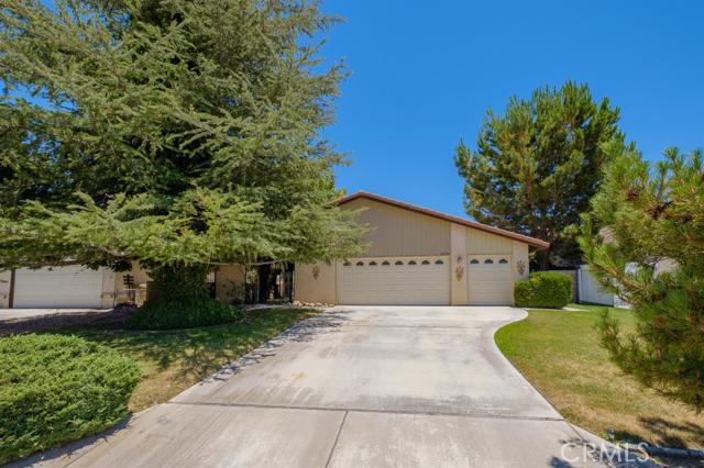 The best priced home in Spring Valley Lake! This beautiful home has tons of potential. You will be WOWED upon entering through the decorative iron gate leading to the stunning serene courtyard, offering your own private park-like setting. Upon walking into the home you will be greeted by a spacious living area, cascading into the dining room/kitchen area on one side and indoor laundry on the other. Additional features in this area include vaulted ceilings, brick fireplace, and wet bar area. This home also boasts a huge master suite with a large tub and bath, 2 additional sizable bedrooms, with fruit trees and mature vegetation in the yard. You'll have no neighbors behind you as this property backs up to the Mojave Riverbed offering a great view. All of this in the highly desired Spring Valley Lake community, the High Desert's oasis with fishing, swimming, boating, and other amenities available such as tennis, a community pool, private golf, and more! Come schedule your private showing today!