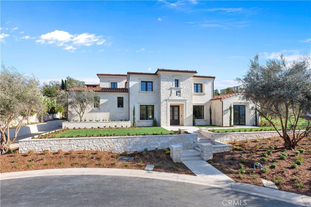 BRAND NEW SHADY CANYON CONTEMPORARY LIVING AT ITS FINEST 6 BEDROOMS | 7 BATHROOMS | 10,000+ SF | 27,412 SF LOT
Welcome to “Villa Classico” Shady Canyon’s most remarkable Brand New Custom Estate Home on a Premium Cul-de-sac lot nestled in the hillside of one of Southern California’s most prestigious guard-gated communities. Open & contemporary floor plan designed by renowned CR Carney Architects, provides the ultimate in custom builds. The beautifully landscaped grounds w/ Portuguese Limestone pavers, compliment the interior's high ceilings, large doors & windows and custom European White Oak flooring. Gourmet kitchen w/ custom porcelain countertops, designer full backsplashes, White Oak Cabinetry, upgraded appliances, custom range hood. Kitchen opens to a spectacular Great Room that merges seamlessly w/ the outdoors through large sliding pocket doors. Main level “Next-Gen” Suite boasts private entrance, separate living area, kitchenette, full bath. Master Suite includes a fireplace, private balcony w/ sliding doors for sweeping canyon views. Master Bath offers glass-enclosed-oversized shower. “His-and-Her” walk-in closets w/ custom built-ins. Downstairs Media Suite & Game Room. SMART home pre-wiring. Exclusive Shady Canyon community includes Tom Fazio Golf Course & Clubhouse with a world- renowned chef. Minutes to beaches, world-class shopping, dining, & entertainment & minutes to John Wayne International Airport and FBOs, as well as the 5, 405, 73, and 133 Freeways.