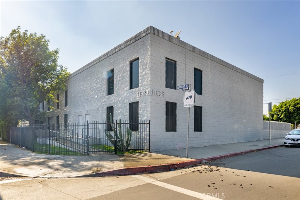 Searching for the perfect warehouse/office building with space and the ideal location? Look no further than this incredible 3,200-SqFt warehouse full of endless possibilities. Gated entry to the property with ample gated parking spaces, plus an alley access way. This is a corner lot building, perfect for very visible signage, located on a large 6,539-SqFT lot in Sun Valley. Great location, close to the 5 freeway. The building boasts a new 3 phase 400-amp panel, upstairs a full kitchen and bathroom with a shower, high ceilings, recent remodel, many secured windows, and manicured landscaping. Centrally located in the San Fernando Valley, near many commercial and industrial properties that offer a large variety of services, including but not limited to manufacturing, service industries, shipping, and storage. This property will make an ideal owner user space. Loan carry back may be an option with certain criteria.