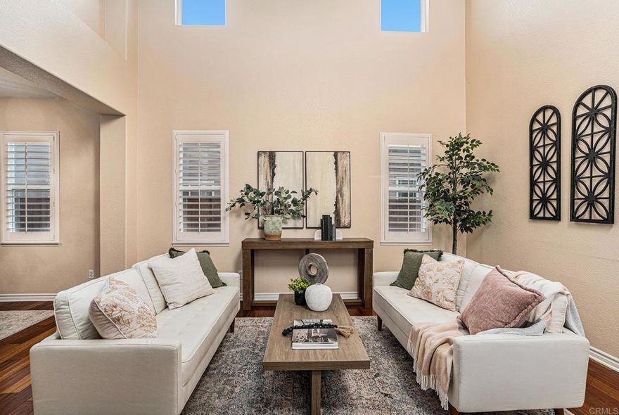 Welcome to Rolling Hills Ranch! Nestled in the coveted and gated neighborhood of Chambord, this grand and beautiful home boasts 3 bedrooms with an optional 4th downstairs. Enjoy the added privacy of a secured, gated courtyard. Hardwood floors flow through the lower level, complemented by plantation shutters, owned solar and dual-zoned a/c. The kitchen opens to the spacious family room, ideal for entertaining guests. Microwave, cooktop/hood, double oven & dishwasher are 3 years old. The formal living room is open & airy with a double height ceiling next to the formal dining area. The versatile downstairs office can easily serve as a 4th bedroom. Step outside from the family room to a backyard designed for entertaining, complete with pavers, turf, and an aluminum pergola equipped with ceiling fans for those warm summer afternoons. Upstairs, discover a cozy flex space perfect for reading and relaxation. The master suite offers a second fireplace and beautiful views. This home offers ample storage throughout. The laundry room is next to the kitchen with a sink and second refrigerator. The 3 car garage has been painted, includes extra lighting, and offers hanging storage. This neighborhood also has its own pool, hot tub & BBQs within the gates. Solar will be paid off at close of escrow by the seller. Water heater replaced in 2020. Attic has large storage space. The Rolling Hills Ranch HOA offers 5 pools (in addition to the one mentioned), 9 tot lots and walking trails. NO MELLO ROOS!