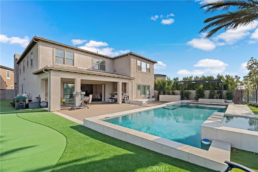 More than 13000 sqft Lot with Incredible View!!! Located in the prestigious guard-gated Altair community, this rare luxury estate offers breathtaking, unobstructed views from the backyard and 4 of its 5 bedrooms. Sitting on a massive 13,000 sq. ft. lot, this stunning home boasts 4,820 sq. ft. of living space, featuring 5 bedrooms, 6 bathrooms, and a private office (convertible to a bedroom). Designed for both comfort and elegance, the home includes dual primary suites, an oversized balcony, and a resort-style backyard with a private pool, perfect for enjoying the scenic surroundings. The extra-long driveway provides ample parking, complementing the spacious 3-car garage. With over $500K in premium landscaping upgrades, this property is a true gem in Altair, offering luxury, space, and spectacular views. Don’t miss this rare opportunity!
