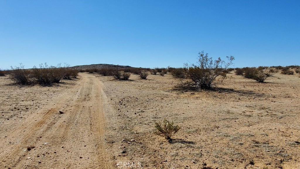 Corner parcel, 10 acres +/-, just east of Aerial Acres, area of North Edwards. Adjoining parcel also available. *Buyer to make their own independent investigations regarding zoning & General Plan Designations, Hazard Zones, Availability & Costs of utilities.