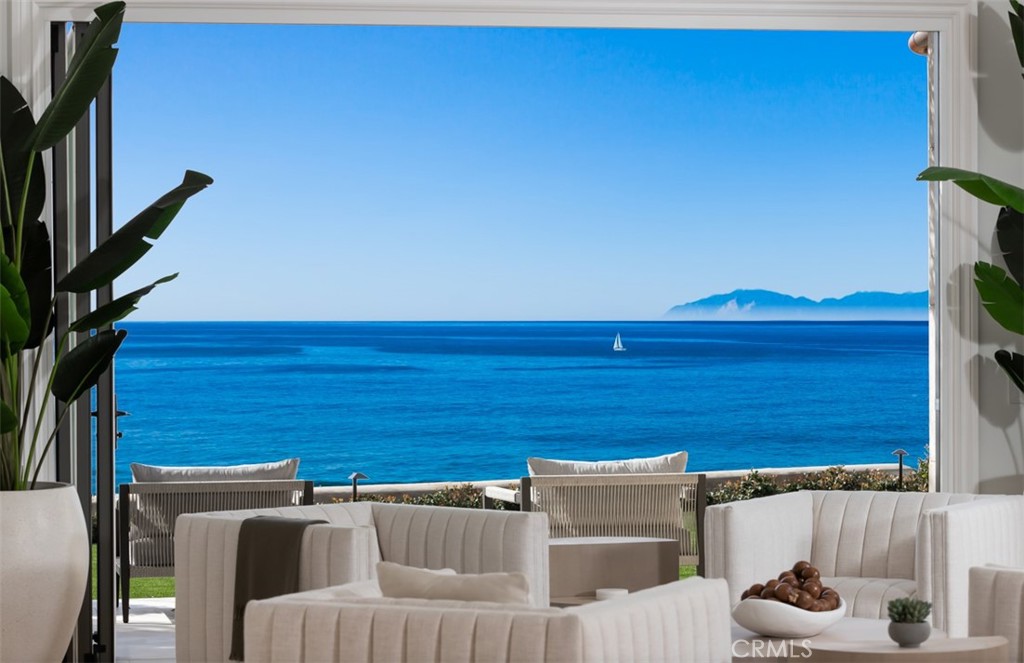 Championed on a front-row, premium lot to emphasize the dramatic frontage and breathtaking views, 38 Pelican Crest Dr. offers expansive scenes of the Pacific Ocean’s sparkling waters and rolling cliff-sides of Catalina Island, along with an absence of impeding roof-tops thanks to the "front row" location of this dream estate which provides a surreal backdrop from nearly every room in the house. This newly renovated designer masterpiece offers nearly every amenity imaginable from breathtaking sit-down ocean views from the majority of the property, re-designed open concept floor-plan, 5 beds + 7 baths, office, theater, gym, game room, bar, and exceptional privacy. Characterized by imported, custom stone, solid Oak flooring, and magnificent-lighting throughout, this property sets an unprecedented standard for design through its careful selection of the richest materials, lustrous textures, and serene patterns. The property offers a main floor over-sized guest suite as well as an office while the upper floor hosts a lavish primary suite with split his & hers closets and baths showcasing floor to ceiling stone clad walls, European closet systems, and marvelous stone countertops; as well as three additional spacious guest suites with designer baths. The basement level boasts a billiards room, move theater, candy wall, well appointed gym, and multi-car garage. The estate is rounded out by a resort style backyard that offers some of the best views the California coastline has to offer while creating a fun & inviting space thanks to a newly designed pool + spa, BBQ bar island, multiple sitting areas, & fireplace.
