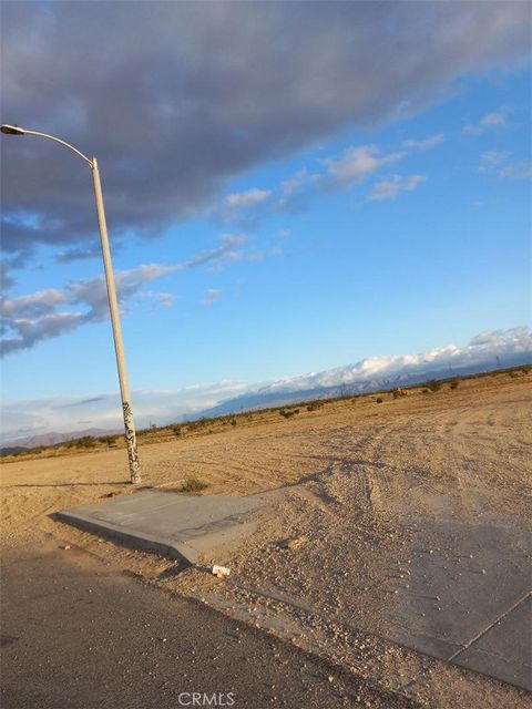 Photo of 0 throuoise Road, Adelanto, CA 92301 (MLS # HD23199363)