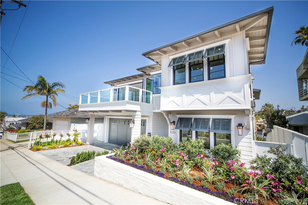 This newly constructed Modern Plantation home is redefining luxury living thanks to its exquisitely unique design, high-end finishes, and breathtaking ocean and city views! Situated in a quiet, premier section of Hermosa Beach, this 6290 sq ft house is the perfect combination of luxury, class, comfort and functionality. The Master Suite is expansive and bright, fitted with a fabulous fireplace, private balcony, substantial walk-in closet, and lavish master bathroom. Downstairs, you will find the entertainment area, where you can relax in the recreation room, enjoy a state-of-the-art home theater, workout in the exercise room, or open the folding doors to the ample backyard. Upstairs, the open floor plan provides impeccable panoramic ocean views whether you’re spending time in the stunning kitchen, delectable dining areas, grand great room, or large heated outdoor living space with a built-in barbecue. This floor has 3 sets of folding doors, making the indoor-outdoor experience one that cannot be beat. For an even more remarkable view, head up to the rooftop deck that offers surreal sights of the South Bay and is built to support a Jacuzzi. To top it all off, this home has high ceilings, 5-7 sizable bedrooms, an elevator, a laundry room, and a centralized sound system. Absolutely no expense spared with immense attention to detail by devoted developer Nadeem Khulusi, showcasing his commitment to quality and passion for excellence. You’ll have to see it to believe it!