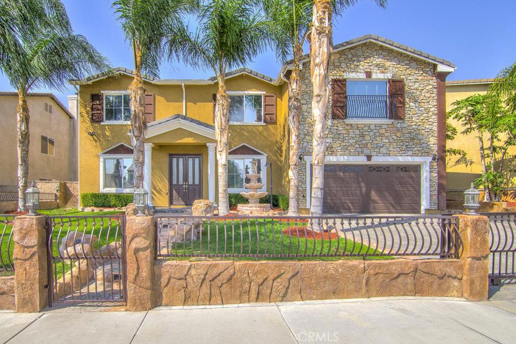BEST PRICED "HUGE HOME" FOR IN JURUPA VALLEY! With 4,693 sqft of living area, this amazing full of light property offers 5 bedrooms and 3.5 bathrooms + Office. Additionally, this large beauty is located in a serene area of Jurupa and is conveniently located near shopping centers, parks and freeway access. This home is a must see! It features travertine flooring, crown molding throughout the house, high ceilings, polarized windows, an impressive pool with spa, built in barbecue, office/gym/bedroom downstairs, large gourmet kitchen with Built-in oven, range top, microwave and dishwasher all stainless steel appliances. , open floor plant, large garage and laundry room, tons of storage space, recently painted, terrific double-sided fireplace facing both the dining area and family room, super large master bedroom with red marble shower and finishes, master retreat, enormous walking closet, a 2nd master bedroom and a balcony/patio that extends from side to side of the house and more, much more! Did I mention the schools?This property may not last long, so act fast. All buyers are welcome!
