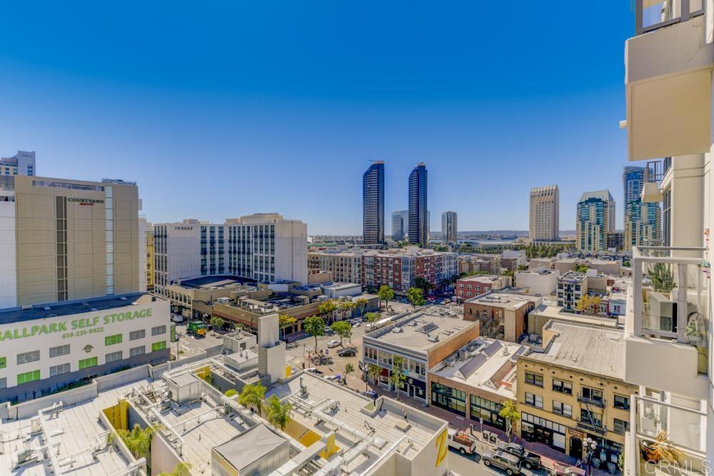 Enjoy urban living & breathtaking views in this 2bed/2bath condo on the 9th floor of the prestigious Alta building! Your own private balcony boasts gorgeous views of San Diego Bay during the day & in the evenings, enjoy the city lights. The interior flows seamlessly from living room to dining area to kitchen. Interior is light and bright with tons of storage space & gorgeous hardwood flooring. Kitchen features large pantry & includes high-end stainless steel appliances. Stacked washer/dryer in hallway closet. 2 assigned parking spots in underground garage, as well as your own assigned storage. Located in the heart of Gaslamp.. enjoy East Village Downtown, Petco Park & more!