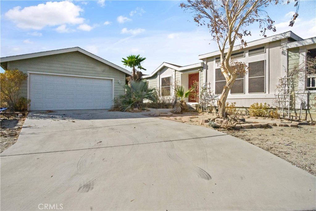 Breathtaking Single-Story Home with Newly Redone Septic System – Ready for You!
Welcome to this incredible 4-bedroom, 2.5-bathroom, 2,613 sq. ft. single-story manufactured home with 433a certification, and solar lease nestled on an expansive 14,810 sq. ft. lot in Whitewater—conveniently located near Desert Hot Springs and Coachella! This property offers a perfect blend of elegance, comfort, and functionality, with a detached, finished 2-car garage, newer remodeled guest bathroom with newer sink, sink plumbing and flooring. A newer septic leach line system, was also newly redone ensuring long-term peace of mind for the new owner.
The outdoor space is just as remarkable! The enormous covered patio provides the perfect setting for entertaining or enjoying serene evenings, while the massive yard offers endless possibilities for landscaping, play, or future development. But that’s not all! This property includes an adjacent lot (APN 667-181-005), adding an additional 14,810 sq. ft., bringing the total to 0.68 acres of wide-open space for your imagination to run wild. Whether you want to store, grow, design, or build, the possibilities are endless!
Step inside to discover an open, luminous layout featuring a dual-sided fireplace that creates a cozy ambiance between the living and family rooms. The home is flooded with natural light from oversized windows and boasts both carpet and tile flooring throughout. Adjacent to the living areas, the gourmet kitchen is a chef’s dream, showcasing designer finishes, custom tile countertops, an oversized island, recessed lighting, and an abundance of oak cabinetry. The large walk-in pantry and nearby laundry room, complete with upper and lower cabinets and a half-bathroom, add to the home’s exceptional functionality.
All four bedrooms are located off a private hallway for added serenity. The spacious primary suite offers a true retreat, featuring dual sinks, a soaking tub, a large walk-in shower, a walk-in closet, and ample storage.
This must-see home combines luxury, practicality, and potential—perfect for creating your desert dream. Don’t miss this rare opportunity!