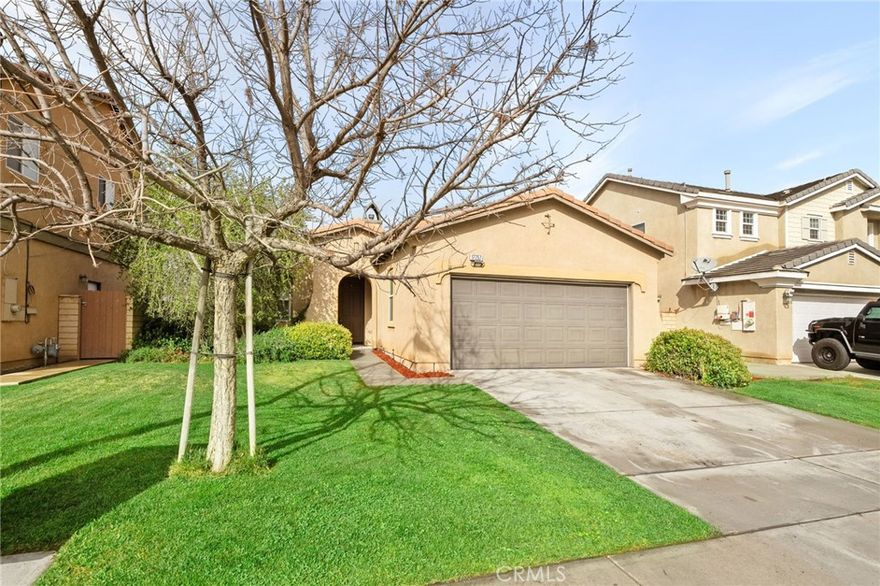 Welcome to this charming single-story home in Moreno Valley, conveniently located near popular shopping and dining options. Offering 1,435 sq. ft. of living space, this home features three bedrooms, two bathrooms, and an attached two-car garage.

Upon entry, you’re greeted by an open floor plan enhanced with tile flooring, recessed lighting, and fresh paint throughout the main living areas. Designed for effortless entertaining, the spacious living room includes a built-in entertainment niche and a cozy fireplace, creating a warm and inviting atmosphere. The kitchen seamlessly connects to the family room and boasts ample upgraded cabinet space, a pantry, and stainless steel appliances.

For added convenience, the laundry room is located inside. The master bedroom serves as a private retreat, complete with an en-suite bathroom featuring dual sinks and a walk-in shower.

Step outside to enjoy the beautifully manicured backyard, complete with a covered patio—perfect for relaxing or entertaining. Plus, with no backyard neighbors, you’ll appreciate the added privacy.

Don’t miss this opportunity to own a wonderful home in a prime location!