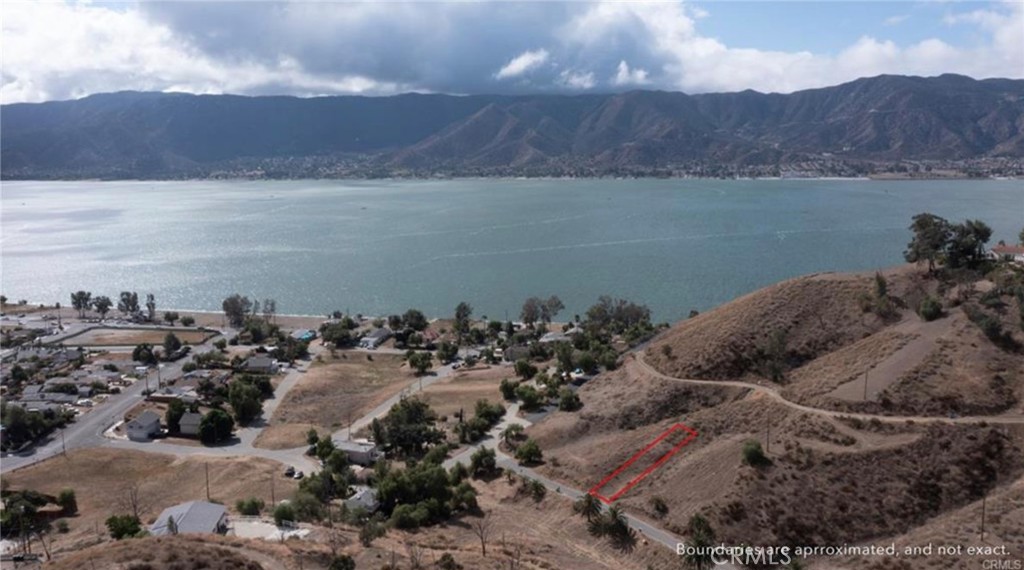 Vacant lot. Walking distance to the LAKE! Buyer & Buyer’s agent to verify utility & zoning info. Property is narrow and unable to be built on currently. If you purchase neighboring properties, you could combine and then build.
