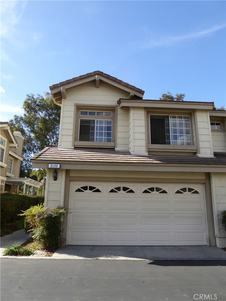 Wonderful opportunity to live in the conveniently locate community of Tustin Ranch. This end unit townhome style condominium features: Open floor plan, Vaulted ceilings, kitchen with granite counters, fresh paint throughout the house, and entry leads to spacious living room with fireplace. Family room with sky light and entertainment niche. Dining Room have sliding door to the backyard. Backyard features patio covers. Master bedroom with vaulted ceiling, 2 closets(1 walk-in closet, 1 sliding door closet) and park view. Mirror wardrobe door in every bedroom. Two car garage with built in storage. Community pool and spa. Close to park with sport courts, tot lots, and much more.