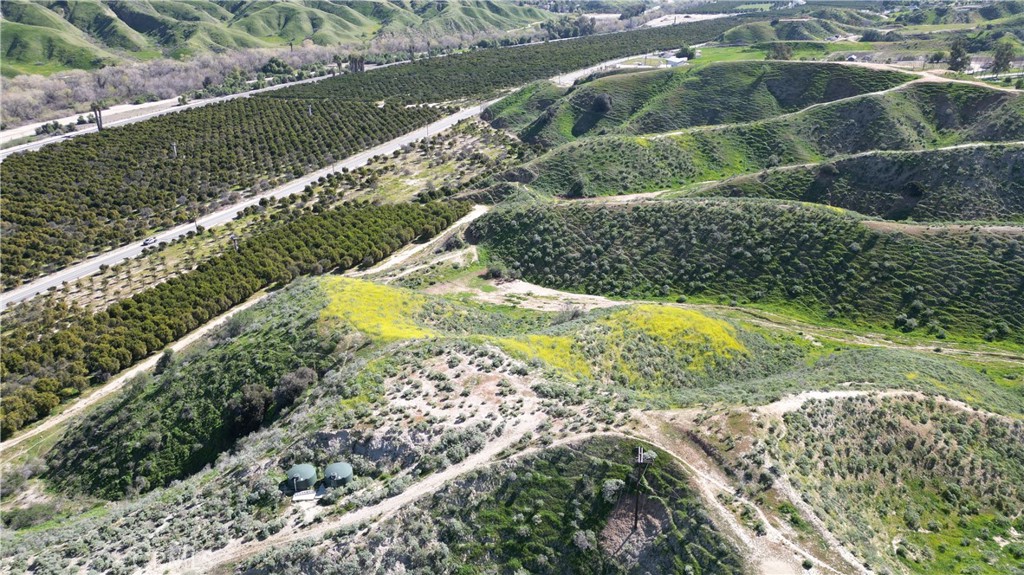 Redlands 2.5 acres lot located near existing homes, wonderful horse ranches and orange groves. This lot has great potential to build your own custom home with stunning views, have your own ranch, or land development for agriculture. Utilities are close by and some neighbors in the area were able to tap into their well at 100ft. Close to Loma Linda Hospital and the 60/10 and the 210 freeway.