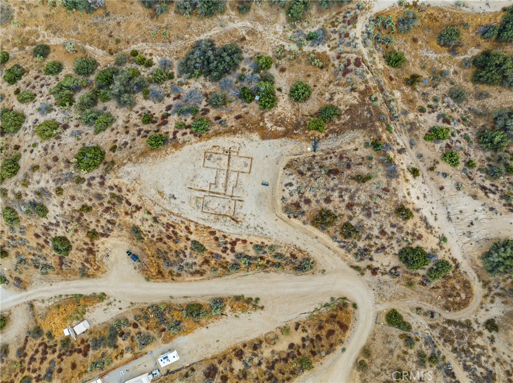 Do you love rural living? Surrounded by mountains and desert sunsets? This 2.53-acre lot is surrounded with potential and views. Easy access to 138 which takes a quick drive to the 15 freeway. Build your family home here in Pinon Hills. Located in a desirable and peaceful neighborhood, this spacious lot provides both privacy and scenic views, with endless potential for various land uses. Surrounded by the beauty of the Mojave Desert and offering stunning views of the nearby mountains and valleys, including Wrightwood and High Desert, this area is renowned for its open spaces and rural living, creating a perfect balance between nature and convenience. In addition to the area's natural beauty, you'll enjoy nearby hiking trails, off-roading adventures, wildlife preserves, and breathtaking sunsets. As an extra benefit, the seller is including two storage containers with the purchase, conveniently placed off to the side. Driveway does have Easement for neighbors' access