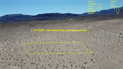 Photo of 0 El Paseo Dr, 29 Palms, CA 92277 (MLS # SW25040027) Photo of 0 El Paseo Dr, 29 Palms, CA 92277 (MLS # SW25040027)