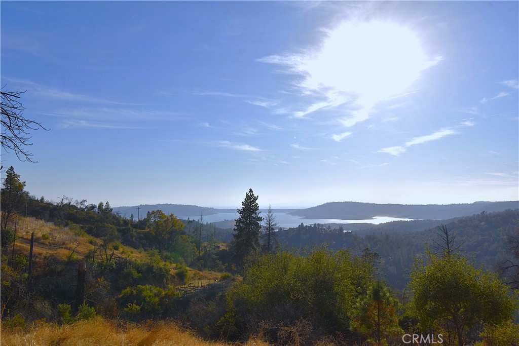 LAKE VIEW PROPERTY!!!
Check out this property with a spectacular view of Lake Oroville. This property sits at 2.87 acres and is located just minutes above the lake. A large pad has been cut in that is oriented perfectly to take advantage of the views of the lake, the dam, and the sunsets. A septic system is in place as well which would be very beneficial for someone looking to build their dream home. If you are into properties with a view, this one could be the one for you!