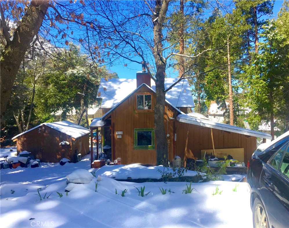 GRETA GARBO & JOHN GILBERT’S LOVE NEST! They almost certainly stayed here once the 1925 “Flesh and the Devil” filming ended – they autographed the kitchen wall along w/ many others! Located in a beautiful wooded setting w/ tall cedars & oaks. There’s ~ 113 ft of street frontage for this 4-season home. It’s a perfect getaway from the May-gray, June-gloom of LA or the sweltering Palm Springs summer. The spacious rustic living rm includes a wood plank ceiling, lrg Anderson double pane wndws, stone fireplace w/ thick log mantle & redwood wainscoting. Roomy upstairs mstr bdrm has lrg wndws w/ dramatic views & ample closets. The updated kitchen is very functional & features a large fireplace w/ insert. This well-laid-out home also has a 2nd bdrm ~ 240 sqft w/ full bth. Could be used as a mother-in-law suite or as a separate unit w/ its own entrance. In winter, the house stays cozy w/ the fireplaces or 2 radiant very efficient propane heaters. Flooring is mostly stone pattern vinyl, w/ original clear-grain spruce planks upstairs. There’s also an A-shaped storage attic ~160 sqft w/ a pull-down stairway. Outside is an 11x16 storage shed. The property is very level by mtn standards, w/ some stone terracing & many hardy iris plants. There’s 2 outdoor dining areas (main garden & 1 for sunsets). 4 vehicles can street park & a loop driveway that holds ~8! It’s w/in 500 ft of Mill Creek, which can be heard in the quiet evenings. Low HOA includes water, side-road snowplowing, & a trash shed. This idyllic property is ~ 1 mi from dwntwn Forest Falls (w/ general store, gift shop, great Mexican restaurant & art gallery). The church, school & post office are ~ 1/2 mi. You’ve probably never heard of Forest Falls, because we have no lake. It also doesn’t have outrageous tourist traffic. The San Bernardino Nat’l Forest & Sand-to-Snow Nat’l Monument surround the community. Only 1 home away from Mill Creek & a hiking trail into the Nat’l Forest, its ~ a 2 mi drive to view scenic Big Falls (at 500 ft, it’s the tallest all-year waterfall in SoCal), & + 1/2 mi to Vivian Creek Trailhead to climb Mt San Gorgonio (tallest mtn in SoCal at 11,503 ft). Forest Falls has easy, safe road access ~ 20 mins to dwntwn Yucaipa & I-10, ~ 60 mins to PS. LA is ~ 80 mi away, west on Hwy 38 to Redlands, then I-10. Summer high temps ~ 85F, winter low ~15F w/ almost constant daytime sunshine during the damp, chill months of LA’s “May-grey June-gloom” and we’re ~ 20 deg cooler than PS’s sweltering summers