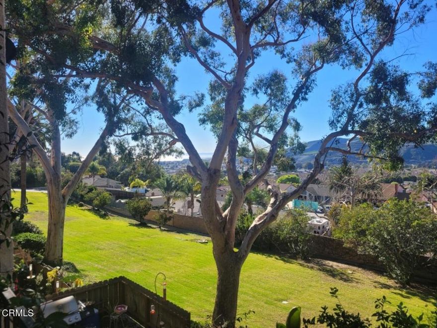 Perfect location to ride your bike on the iconic bike trail in minutes to the Ventura Pier/beach or to the Historic Ojai Valley just in time to watch the famous Pink Moment Sunset on the Topa Topa Mountain's! Enjoy many cute shop's, delicious restaurant's, wineries, breweries, hiking trails, parks, and the Ventura River! This sweet 2 bed 2 bath is ready to move into and a great fit if you are a first time home buyer or are looking to downsize and retire. From the balcony sip on your morning coffee or in the evening a glass of wine while enjoying views of sunset's, surrounding mountain's, distant  ocean-Channel Island view's or wide open space of the green belt and mature tree's! Seneca Gardens has a community pool, spa, clubhouse, fitness center and gorgeous year round weather with an ocean breeze or a touch of warmth from Ojai!  It comes with two parking spots, a one car garage and a separate carport. HOA includes water, trash, sewer, ground maintenance and facilities. Make this lovely space your  special home!