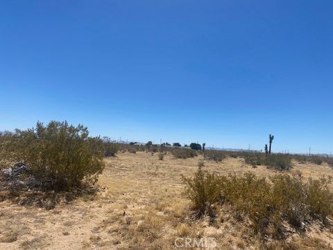Photo of 7 Aztec Lane, Adelanto, CA 92301 (MLS # CV24183455)