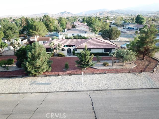 Seller entertaining offers between $305000-$314888 Your home is now ready and available!!! This rare gorgeous estate is a single story with 3 bedrooms plus a HUGE game room with RV PARKING!! You will access your home through ALL PAVED roads!! The sellers have endured many hours of time & love to make this the perfect home and truly shows a pride of ownership. You will enter through a welcoming courtyard that boasts a tranquil fountain. The front entry leads you to the sunken living room with a wood burning stove that will heat your entire home on cold winter nights. The gourmet kitchen boasts newer appliances, a 5 burner stove, trash compactor, tons of cabinet space, some cabinets offering a glass front to show off your beautiful glassware. Skylights throughout the home offer plenty of natural light. This estate comes equipped with a soft water osmosis filter to avoid those hard water stains. Indoor laundry room is also an added convenience with a built in ironing board that is hidden behind a custom cabinet. All bedrooms are good sized and include ceiling fans. This home is a true entertainers delight w/ an over-sized game room equipped with a pool table (negotiable) and a bar area that opens to the fully landscaped backyard with a low maintenance vinyl covered patio. Backyard also offers an array of matured fruit trees to include, bing cherry, apricot, pear, green apple. So many amenities to mention, make your appointment today as this will sell fast!!! Association Amenities: None # of RV Spaces: 0 Special Features: BA,BC,BN,,PTRY,SKNONE Lot Location Type: Standard Location Landscaping: Sprinklers Special Features: Garage Door Opener # of Attached Spaces: 2 # of Detached Spaces: 0