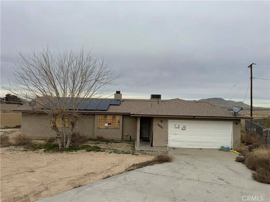 Photo of 16085 Village Dr, Victorville, CA 92394 (MLS # CV26015342)