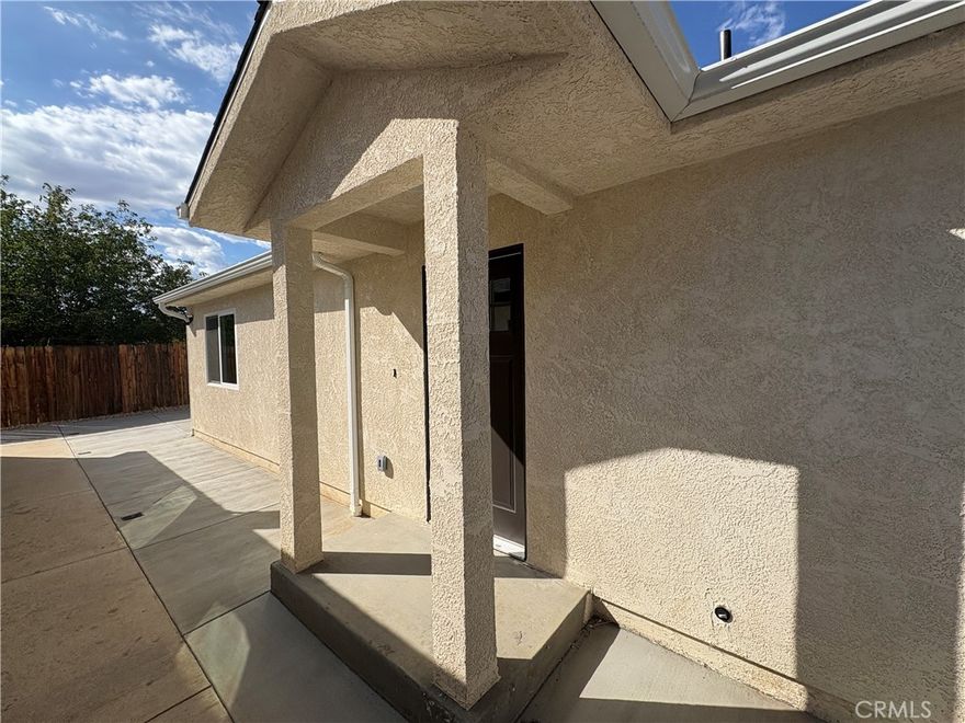 Be the first to live in this brand-new 2-bedroom, 2-bath home! Featuring a spacious master suite with a walk-in closet, this home is designed for comfort and convenience. The kitchen comes equipped with a brand-new dishwasher, microwave, and oven. This fully electric property includes solar panels and low-maintenance desert landscaping, helping you save on utility and upkeep costs.