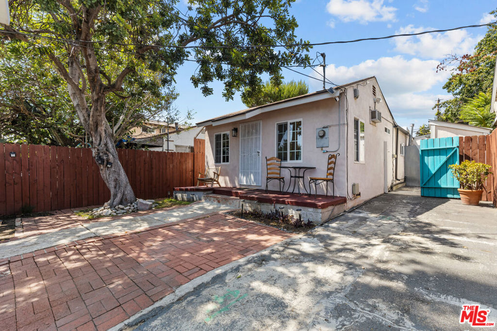 Welcome to this lovely home in the heart of Tujunga - offering an ideal blend of character, functionality, and peaceful outdoor space. Whether you're a first-time buyer or looking to downsize without sacrificing charm, this property is a fantastic alternative to condo or townhome living - with no HOA fees to worry about. Step inside to discover beautiful wood floors, a charming built-in shelf, and thoughtfully crafted tile work in the bedroom wall that showcases true attention to detail throughout the home. Every corner of this home has been lovingly maintained, combining warmth and quality with timeless design. Enjoy beautiful nature and mountain views from the front porch in the front yard, or unwind beneath the covered patio overlooking the lemon tree and garden in the private backyard - complete with a projector screen perfect for watching outdoor movies in the summer! A detached guest house (ADU) sits at the rear of the property - complete with its own kitchenette and bathroom, making it perfect for guests, a creative workspace, or potential rental income! Additional features include: Plenty of parking and tool shed storage, Walkable to coffee shops, restaurants and neighborhood favorites, Peaceful, residential setting with easy access to nature and local amenities! Nearby: La Tuna Canyon Rd, JPL, Glendale, Pasadena and Haines Canyon Hiking Trail. Homes with this much personality and versatility are rare. Don't miss your chance to own a true Tujunga gem!