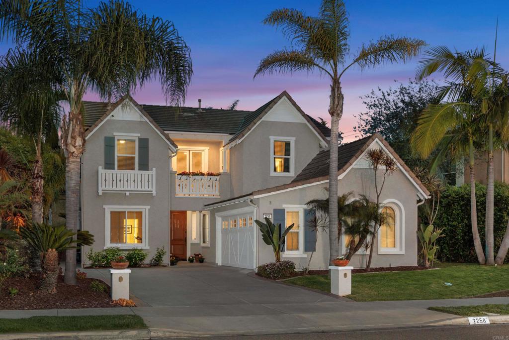 Nestled on a quiet cul-de-sac in the highly desirable La Costa Greens community, this stunning 5-bedroom, 5.5-bath home with a loft offers 3,642 sq ft of beautifully designed living space—and an exceptional lifestyle to match. Freshly painted inside and out, the home welcomes you with impressive curb appeal and a flexible floor plan tailored for modern living. The main level features a full guest suite with a private ensuite bath, an inviting entry lounge or flex space, a dedicated office or additional flex room, a cozy living room, and a spacious great room that combines dining and family areas—offering exceptional flexibility. The overall layout provides ample versatility, including potential for reconfiguration to add an ADU. The thoughtfully sized great room offers just the right amount of space to comfortably accommodate both a living and dining area and features a gas log fireplace for added ambiance. The kitchen enhances the space with granite countertops and full backsplash, a center island with extra storage, stainless steel appliances, and a built-in refrigerator. Upstairs, a dramatic winding staircase leads to four more bedrooms (each with ensuite baths), a large loft, and two balconies, including one off the spacious primary suite. The luxurious primary retreat includes room for a sitting area and a spa-like bath with jetted soaking tub, dual sinks, and dual shower heads. The loft is ideal as a home office, playroom, or optional sixth bedroom. Outside, enjoy a private backyard with paved patio, grassy area, and colorful landscaping—perfect for relaxing or hosting guests. Ideally located between the community’s premier amenities, residents enjoy access to The Presidio, which features a clubhouse, junior Olympic-size pool, spa, fitness center, and a scenic man-made lake with a walking path. Just down the street are tennis and pickleball courts, a playground, and open green space. Additional highlights include a newer tankless water heater, MyQ smart garage door system, new laminate flooring in most bathrooms, and recently upgraded irrigation valves. Close to top-rated schools, world-class golf, upscale shopping, dining, and just minutes from the beach—this home is truly a must-see.