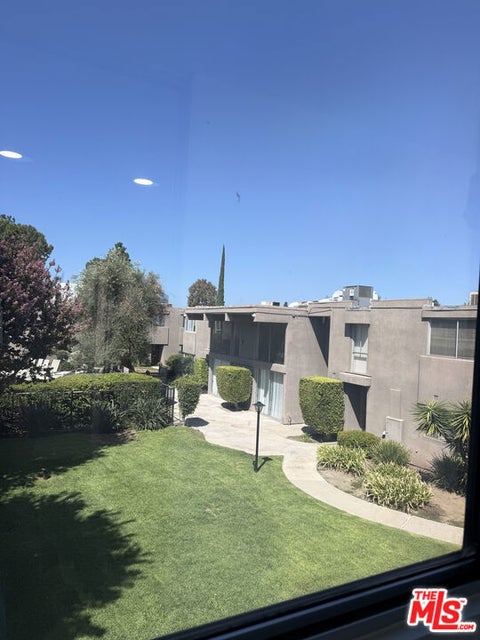 Photo of 18110 Killion Street #10, Tarzana, CA 91356 (MLS # 26987769)
