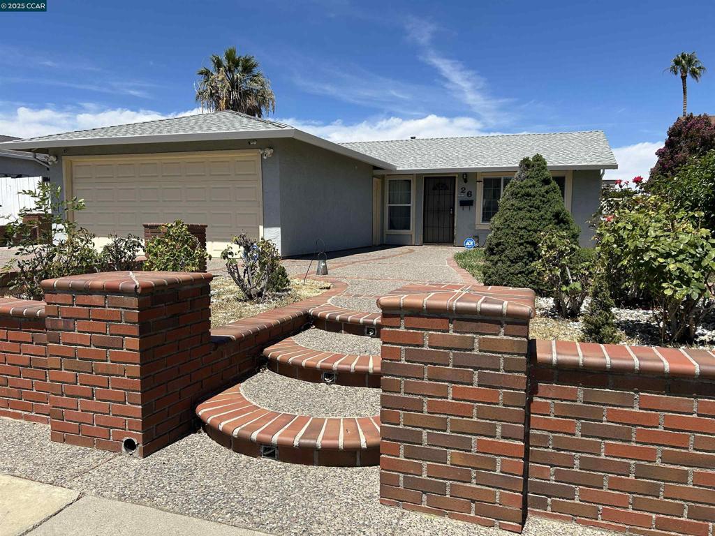 Prime location within the community with easy access to the freeway and shopping. Attractive curb appeal with decorative walkways and a driveway accented by brickwork. The efficient floor plan offers 3 bedrooms and 1 bathroom, with the primary bedroom providing direct access. There is space to easily add a second bath for added convenience. The open kitchen offers room for an island and customization to fit your style. A large, low-maintenance backyard and patio provide space for relaxing, entertaining, or gardening. The property also offers room for future expansion or construction of an ADU. The oversized 2-car garage includes a laundry area with a separate entrance and possible space for a JADU. A new roof was installed in 2024. A large storage shed provides additional utility. Side yard driveway with gate accommodates boat parking. Move-in ready with flexibility and potential for future updates and expansion to meet your needs.