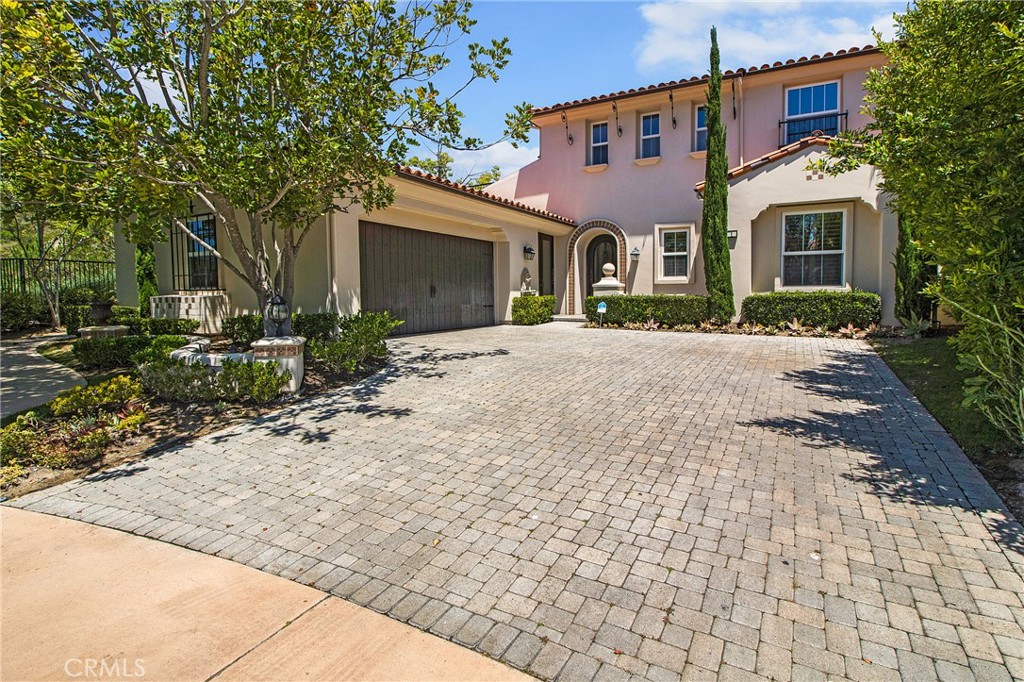 Stunning pool home in prestigious guard-gated Coastal Canyon is now available for lease. End of cus-de-sac location offers the ultimate in privacy and solitude for this lovely Mediterranean residence. Dramatic two story foyer opens up to a beautiful wood paneled library/living area with fireplace, wine fridge and french doors to the outside. The elegant formal dining room is adjacent to the gourmet kitchen with Viking appliances, Sub-Zero fridge, dark wood cabinetry, granite countertops and breakfast bar. Kitchen is open to the large family room with fireplace, built-ins and door to the backyard. The Primary Suite is located on the main floor, with a large walk-in closet with built-ins, spa-like bath with walk-in shower and soaking tub. Also on the main floor is a wood-paneled office nook, ensuite guest room and powder room. Travertine flooring throughout the living area. Upstairs you'll find a balcony with peek-a-boo ocean view, media or play area, and two additional ensuite bedrooms. Fabulous entertaining awaits in the backyard with pool, spa and waterfall, built-in BBQ and bar area. Plenty of space for casual gatherings. The community offers a park at the end of the street, association pool and spa. You will love being close to the coast, near hiking trails and the beach!