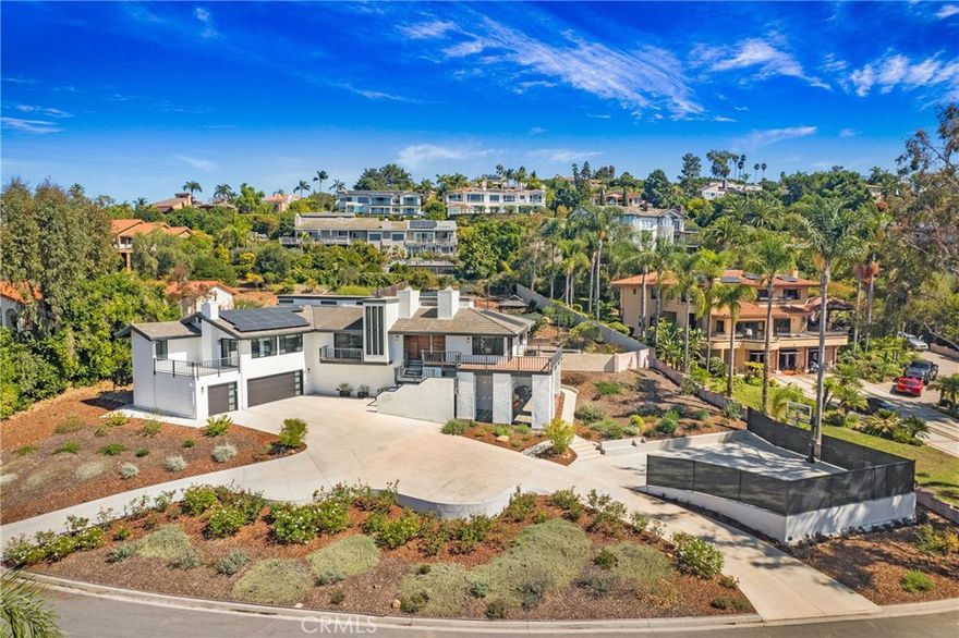 Single-Level Remodeled residence with 4-bedrooms, 3.5 bathrooms and 3,591 sq. ft. of living space on a 0.62-acre lot. Built in 1980 and remodeled in 2021 with over $1M in upgrades. Interior improvements: 30-foot structural beam, custom walnut cabinetry, Italian stonework, hardwood flooring, Thermador refrigerator, 5-in-1 oven/microwave, custom vent hood, CNC walnut hardware. Bathrooms updated with tile, rain shower heads, and pool-accessible powder room. Staircase with slat wall design, electric fireplaces, hidden bookshelf storage, upgraded wiring, plumbing, HVAC, and drywall. Exterior improvements: tile roof, Milgard windows and doors, photovoltaic solar system (paid off), Tesla charger in 3-car garage. Landscaping includes native plants, fruit trees, and stone planters. Backyard improvements: pebble-tech saltwater pool with solar heating, shade sails, basketball/pickleball court, expanded driveway, aluminum railings, sauna, turf pad, gazebo. Lot provides space for a possible Accessory Dwelling Unit (ADU), subject to local regulations. Location near parks, recreation, shopping, dining, and major transportation routes.