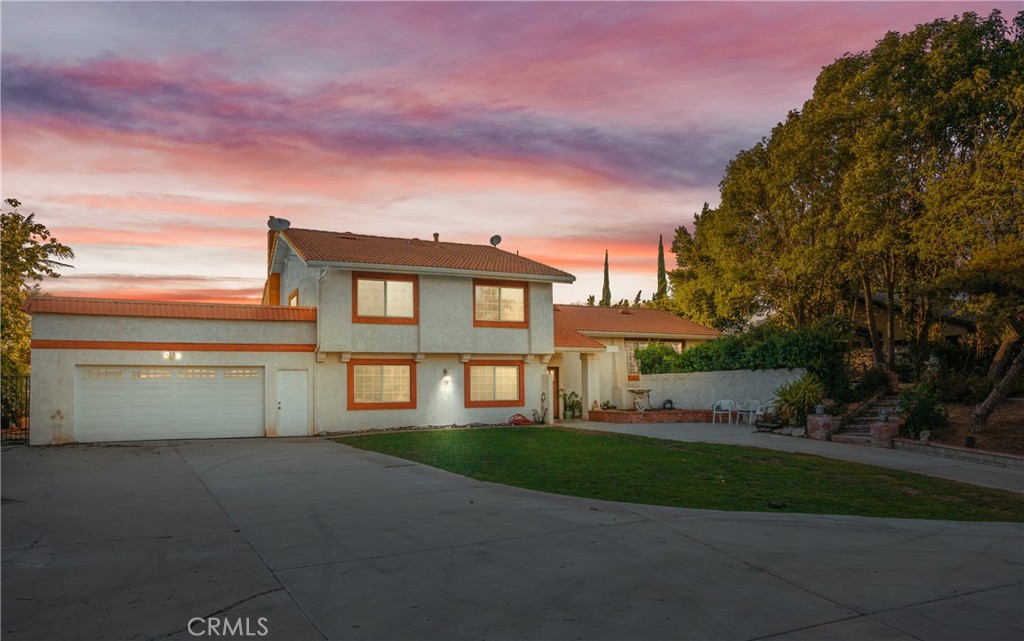 One-of-a-Kind Norco Bluff Estate with Unmatched Views and Endless Possibilities
Welcome to this exclusive Norco Bluff estate, nestled on 1.95 acres overlooking the serene Santa Ana River. Truly a rare gem, this property offers a perfect blend of rural charm and city convenience, making it ideal for equestrian enthusiasts, outdoor adventurers, or anyone looking for space, privacy, and breathtaking scenery.
Unwind after a long day as you take in the panoramic river views, or saddle up and explore miles of nearby riding trails through the Santa Ana Riverbed, Hidden Valley Wildlife Area, and the iconic Horsetown USA. Just minutes from premier equestrian venues like the Ingalls Event Center and Silverlakes Equestrian, this estate is a dream for horse lovers and competitors alike.
Tired of boarding your horses or paying for RV and boat storage? Look no further — this property boasts abundant open space for your horses, farm animals, trailers, boats, and RVs. Enter through a private electric gate to discover a large, versatile open area ideal for a horse arena, pasture, or additional storage. The estate includes a five-stall breezeway barn with attached pipe corrals and a dedicated tack/feed room.
Perfect for multi-generational living or income potential, the estate offers two separate residences:
Main Tri-Level Home (Approx. 2,973 Sq Ft): Features 4 bedrooms, an office with its own bathroom (potential 5th bedroom), a spacious living room with rich wood flooring, a separate dining room, and a gourmet kitchen with granite counters, stainless steel appliances, and ample cabinetry. The luxurious master suite includes a sliding door to a large private deck, dual sinks, soaking tub, and walk-in shower.
Private Guest House (Approx. 1,500 Sq Ft): A charming single-story home with 3 bedrooms and 2 bathrooms — ideal for extended family, guests, or rental income.
Entertain year-round in your resort-style backyard, featuring a sparkling in-ground pool and spa, built-in BBQ area, half-court basketball, and an expansive wood deck perfect for enjoying sunrises, sunsets, or starlit evenings.
Additional highlights:
Private well water system with an incredibly low monthly water bill (~$100/month)
Rare opportunity in one of Norco’s most sought-after bluff locations
Homes like this rarely hit the market. Don’t miss your chance to own a piece of Norco’s premier bluff-side living — where nature, privacy, and equestrian lifestyle converge.